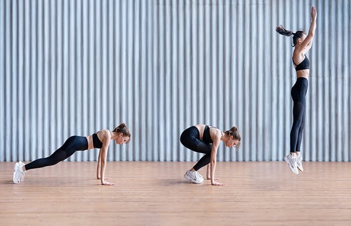 Fitness enthusiast doing burpees, a dynamic bodyweight exercise combining strength and cardio for full-body conditioning