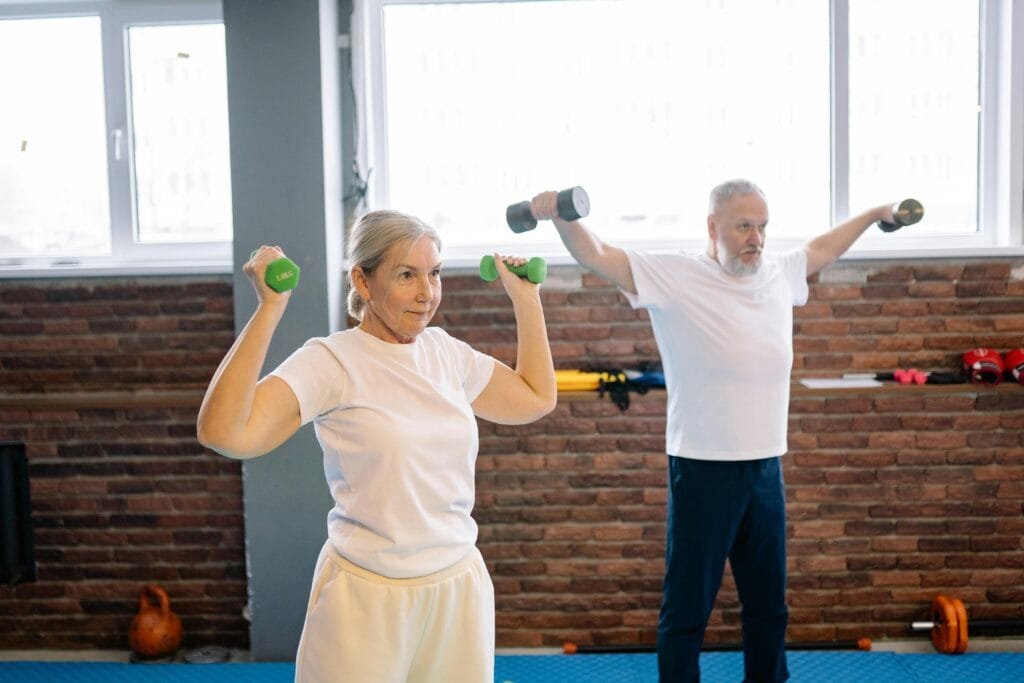 Individual stretching with dumbbells to improve flexibility